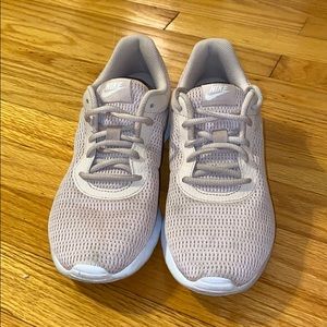 Nike blush colored running shoes, lightly worn